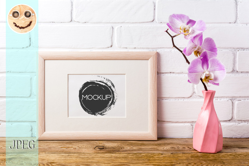 wooden-landscape-frame-mockup-with-pink-orchid