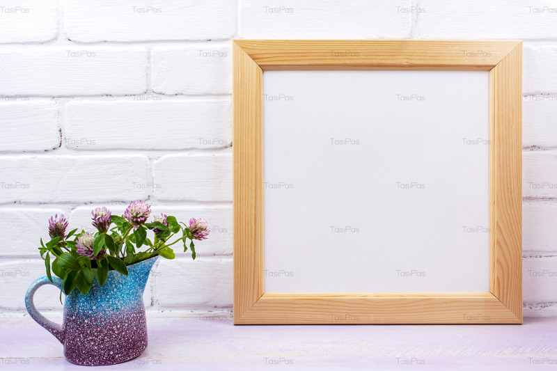 wooden-square-picture-frame-mockup-with-pink-clover