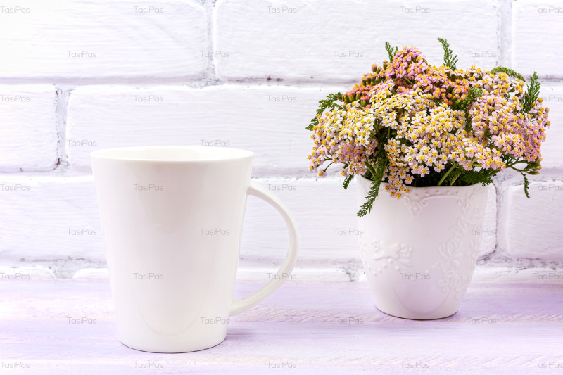 white-coffee-latte-mug-mockup-with-pink-yarrow