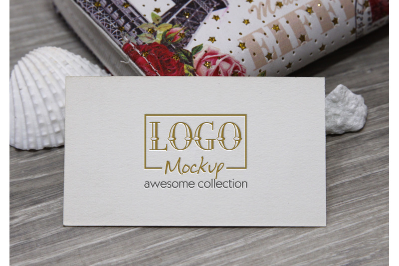 logo-mockup-with-white-stones-and-seashels