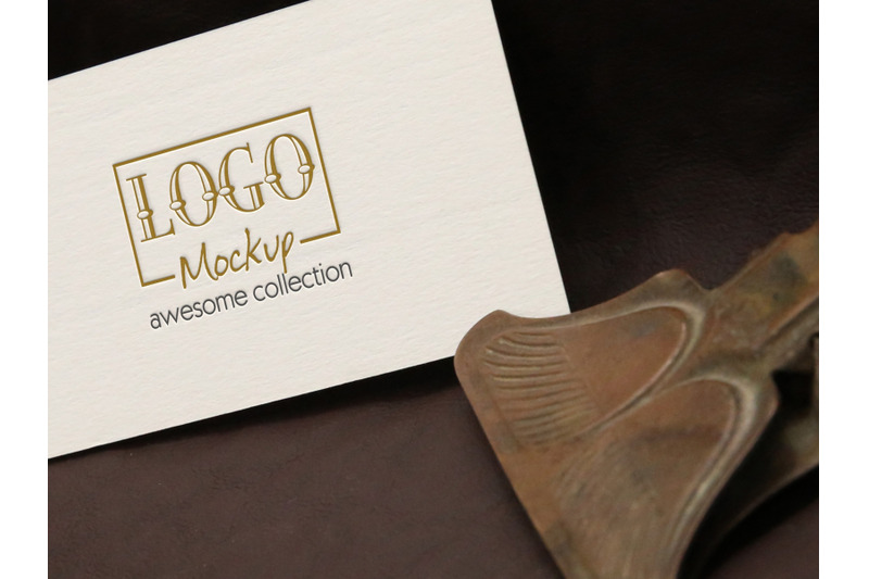 logo-mockup-with-vintage-clip-on-leather-background