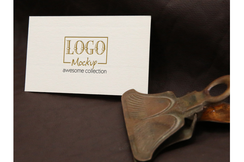logo-mockup-with-vintage-clip-on-leather-background