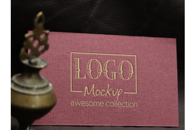 logo-mockup-with-vintage-miniature-lamp-design