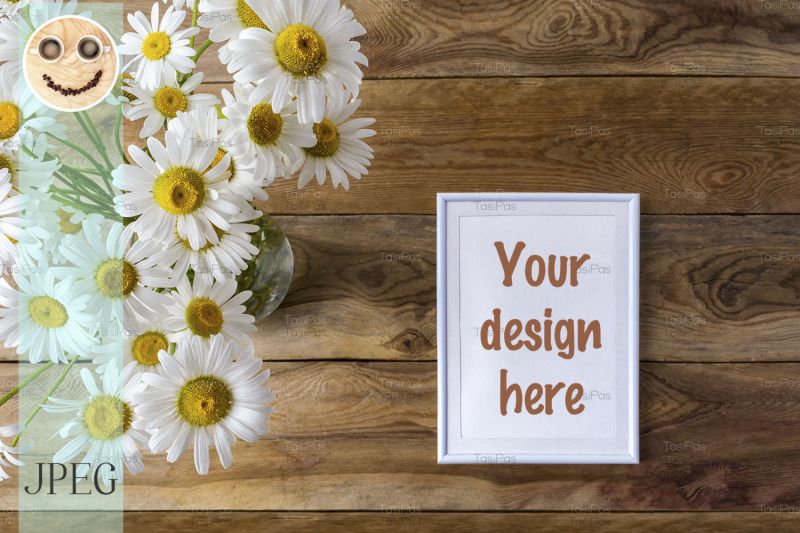 white-small-frame-mockup-with-daisy-wildflowers