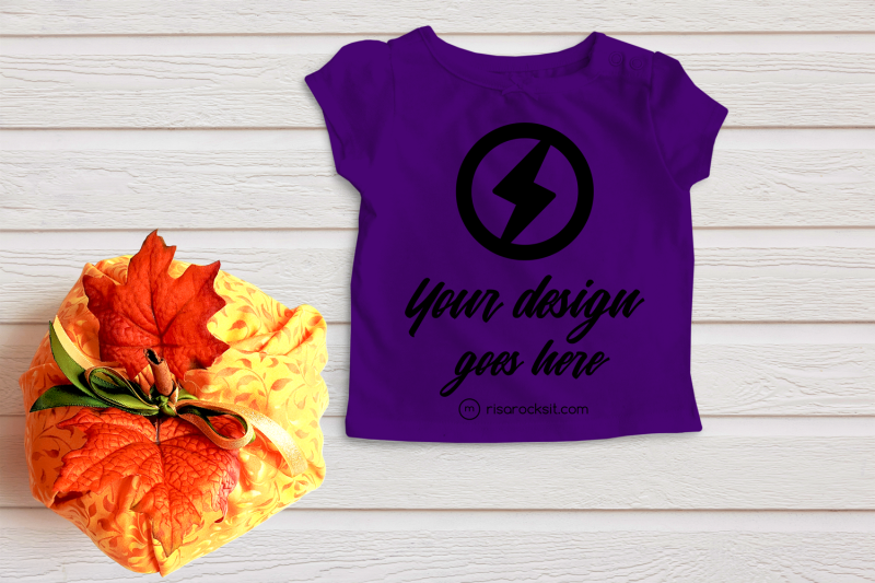 folded-tee-with-fall-pumpkin-png-mock-up