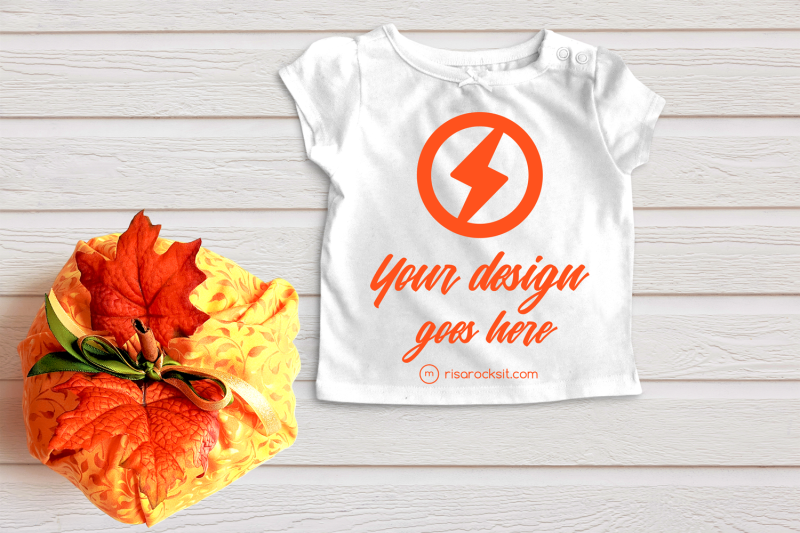 folded-tee-with-fall-pumpkin-png-mock-up