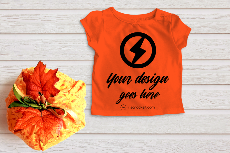 folded-tee-with-fall-pumpkin-png-mock-up