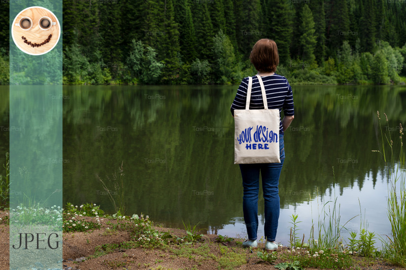 woman-carrying-tote-bag-on-the-lake-shore-mockup