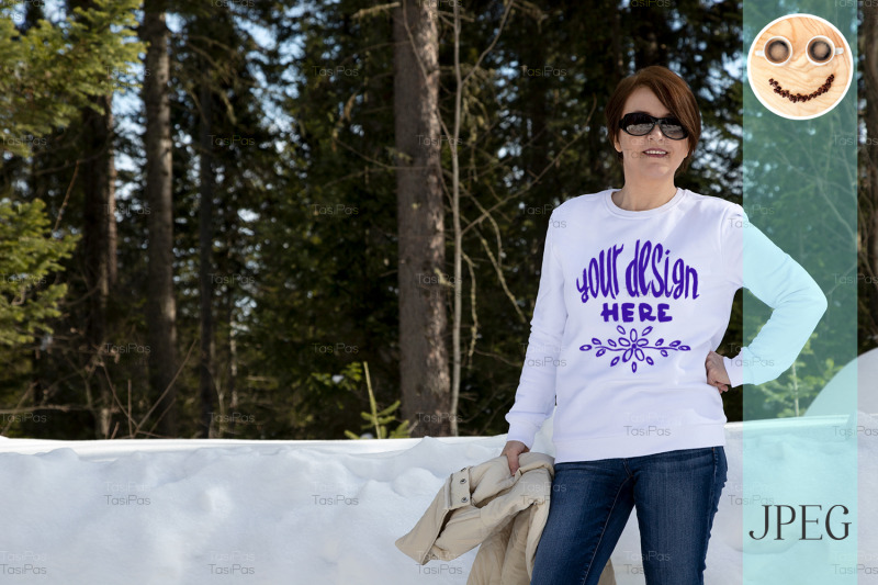 white-sweatshirt-mockup-of-a-woman-in-the-winter-forest