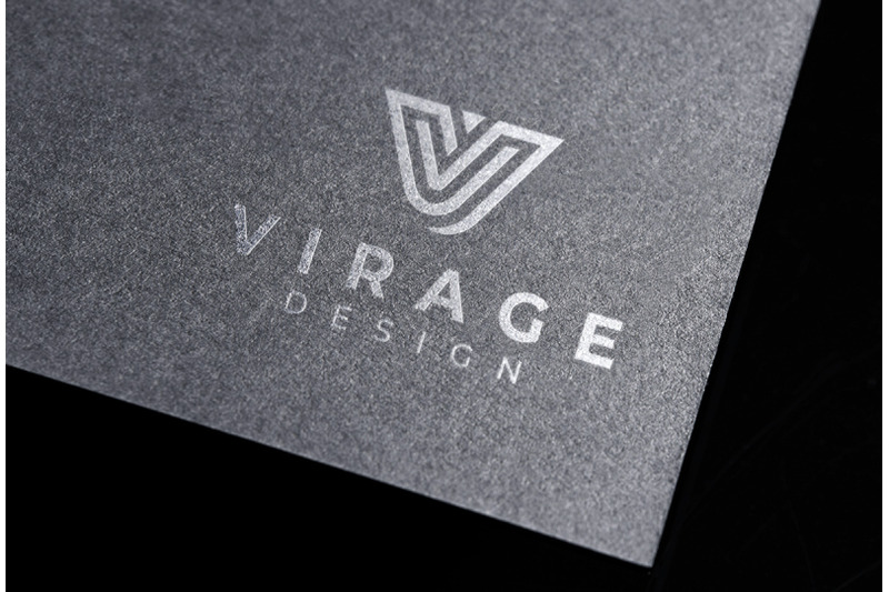logo-mockup-stamped-silver-logo-on-dark-gray-card