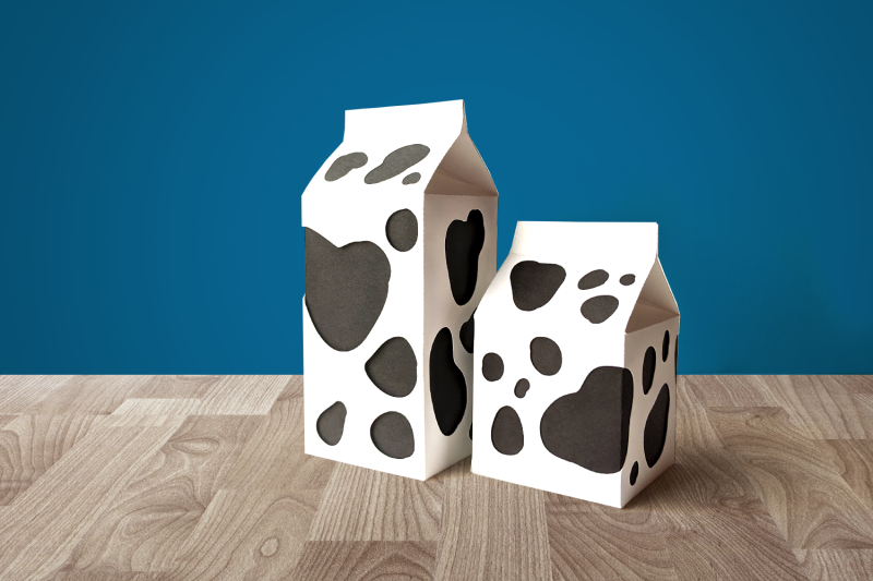 milk-carton-boxes-with-cow-spot-cutouts