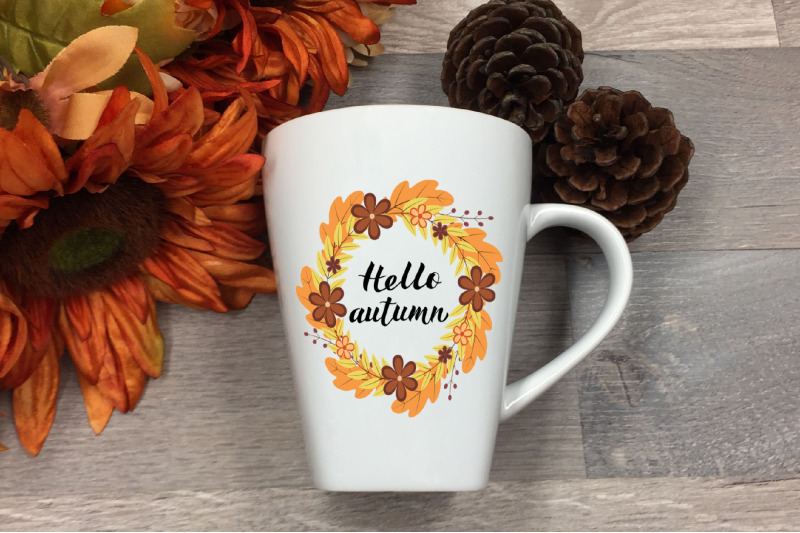 hello-autumn-lettering-in-wreath-with-colorful-leaves-and-flowers