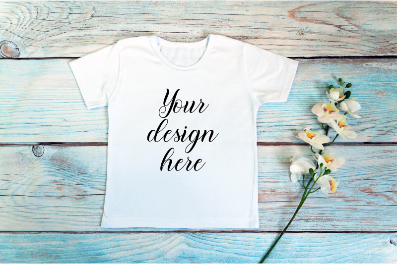 kids-white-t-shirt-mockup-on-a-wooden-background