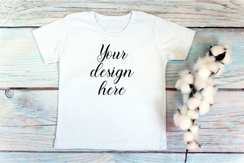 kids-white-t-shirt-mockup-on-a-wooden-background