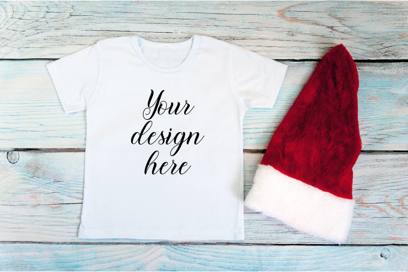 kids-christmas-white-t-shirt-mockup-on-a-wooden-background