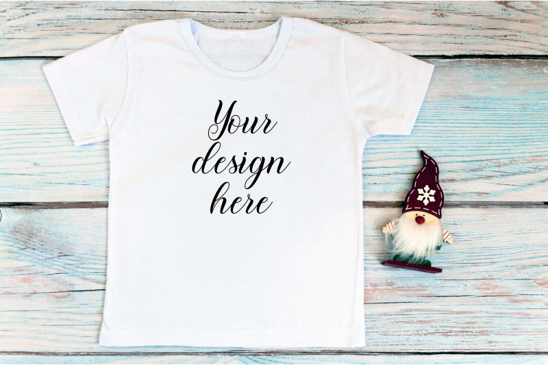 kids-christmas-white-t-shirt-mockup-on-a-wooden-background