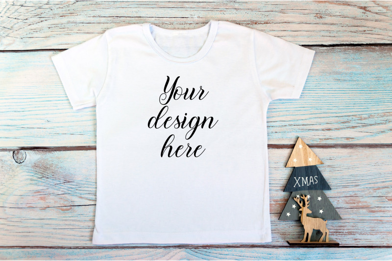 kids-christmas-white-t-shirt-mockup-on-a-wooden-background