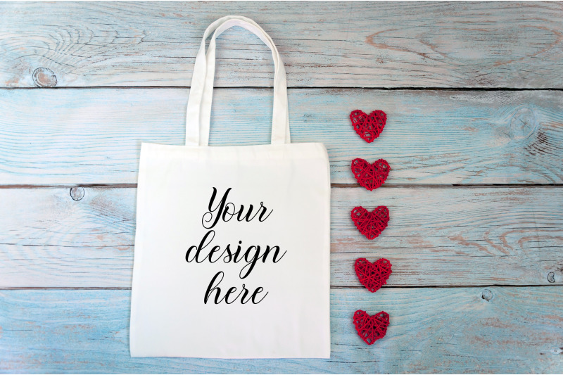 valentines-day-white-tote-bag-mockup-on-a-wooden-background