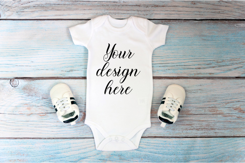 baby-bodysuit-mockup-on-a-wooden-background