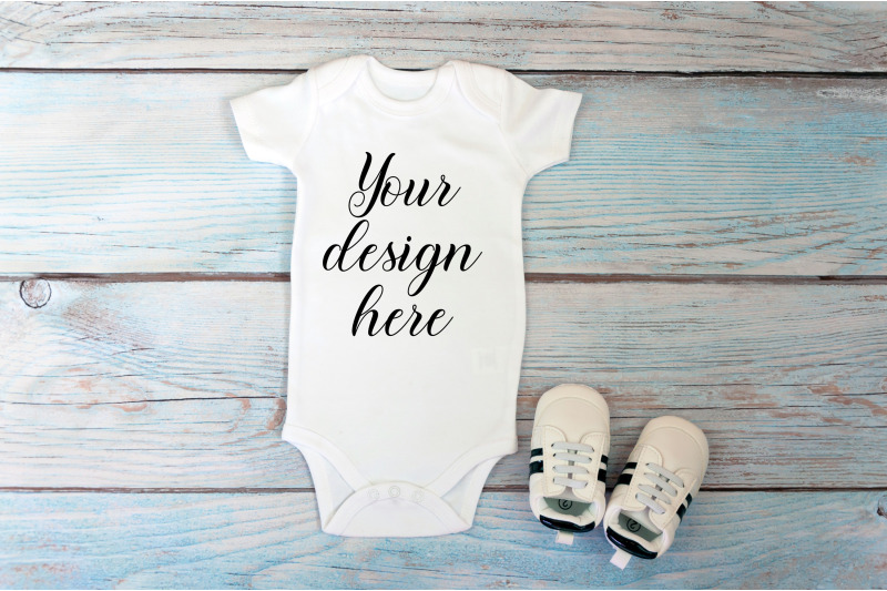 baby-bodysuit-mockup-on-a-wooden-background