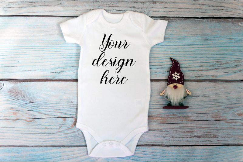 christmas-baby-bodysuit-mockup-on-a-wooden-background