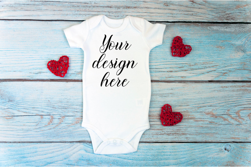 valentines-day-baby-bodysuit-mockup-on-a-wooden-background