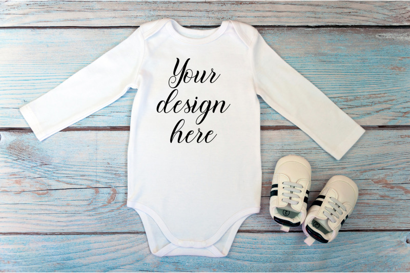 bodysuit-mockup-with-long-sleeves-on-a-wooden-background