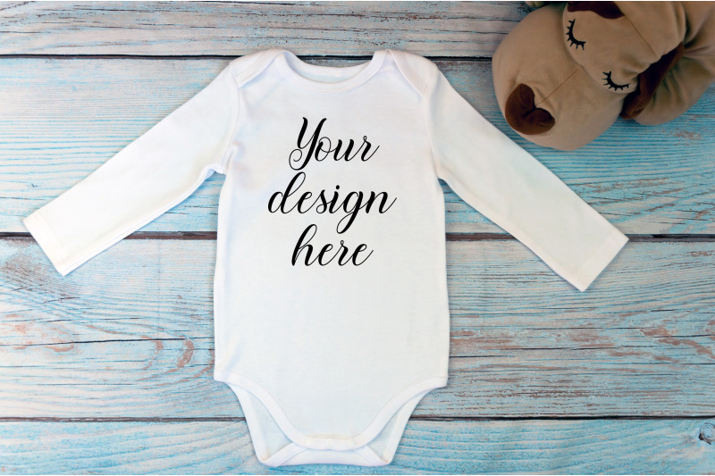 bodysuit-mockup-with-long-sleeves-on-a-wooden-background