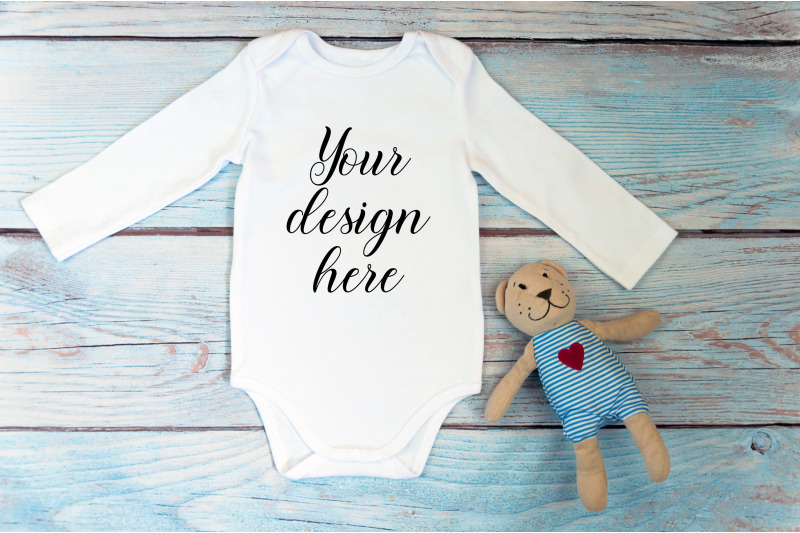bodysuit-mockup-with-long-sleeves-on-a-wooden-background