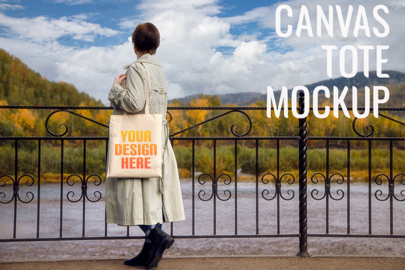 woman-in-classic-trench-coat-holding-tote-bag-mockup