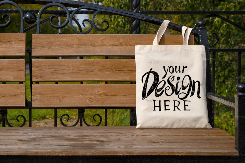 rustic-tote-bag-on-the-garden-bench-mockup