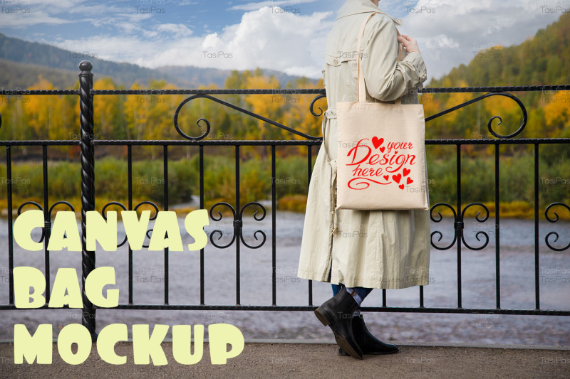 woman-in-beige-trench-holding-tote-bag-mockup
