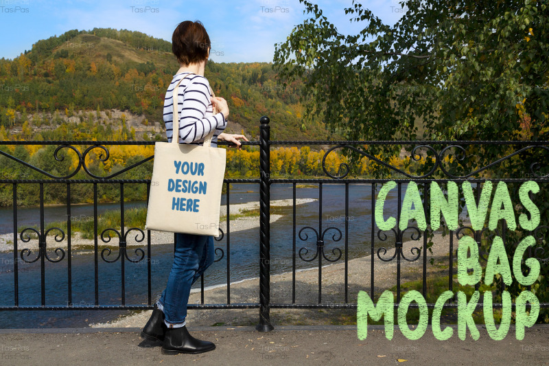 woman-holding-tote-looking-at-the-river-mockup