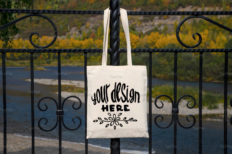rustic-tote-bag-on-the-park-fence-mockup