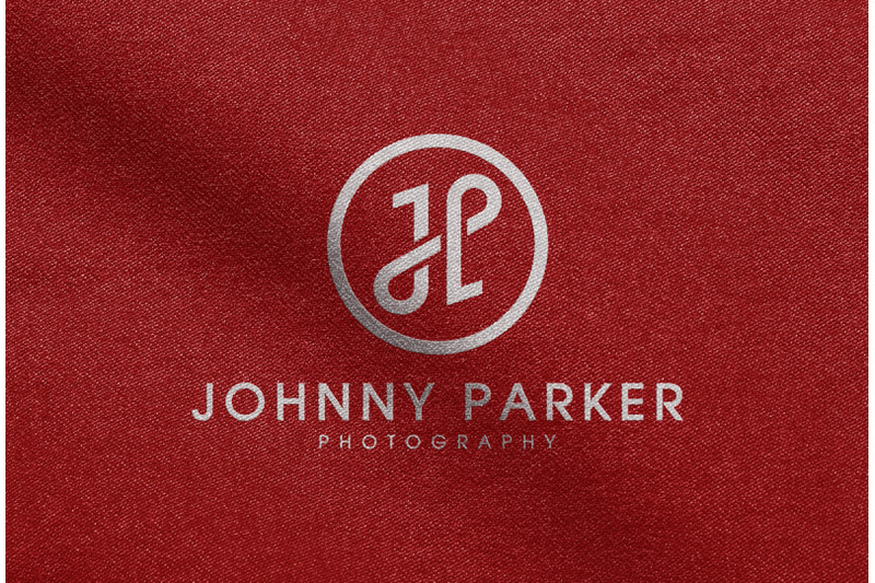 white-logo-mockup-printed-on-red-fabric