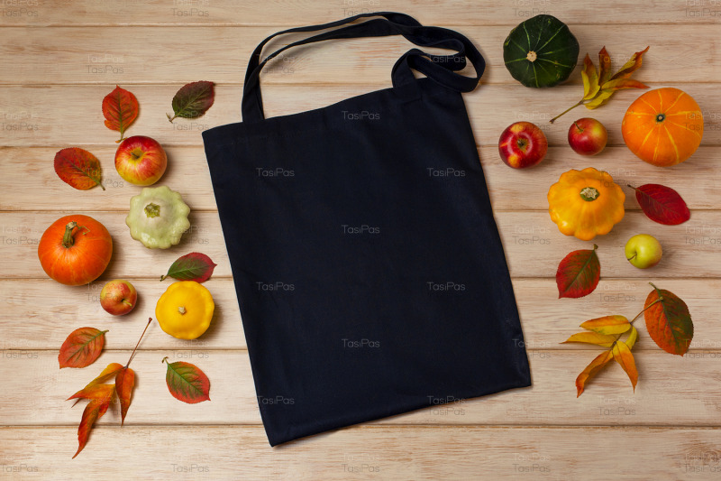 black-tote-bag-mockup-with-pumpkins-and-apples