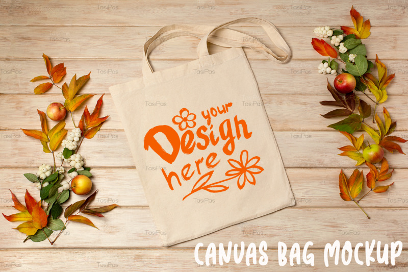 rustic-tote-bag-mockup-with-fall-leaves-and-ghostberry