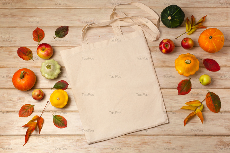 rustic-tote-bag-mockup-with-pumpkins-and-fall-leaves