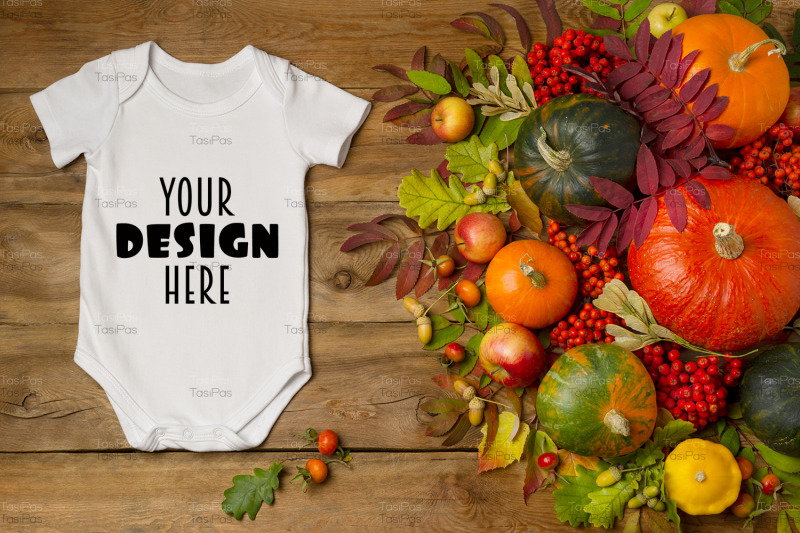 white-baby-short-sleeve-bodysuit-mockup-with-apples-and-rowanberry