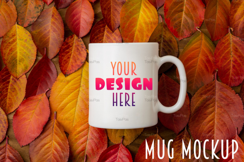 white-coffee-mug-mockup-with-red-yellow-fall-leaves