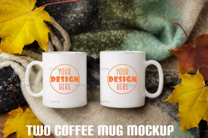 two-white-coffee-mug-mockup-with-woolen-scarf-and-fall-leaves