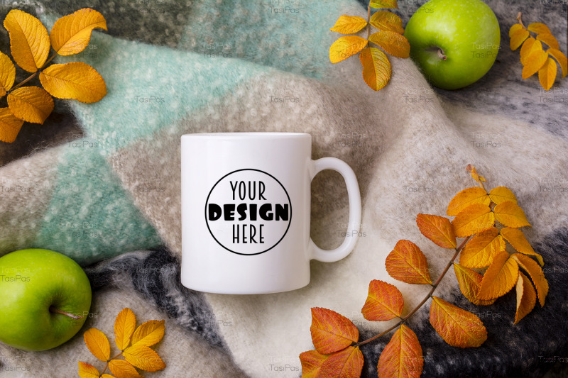 white-coffee-mug-mockup-with-woolen-blanket-apples-and-fall-leaves