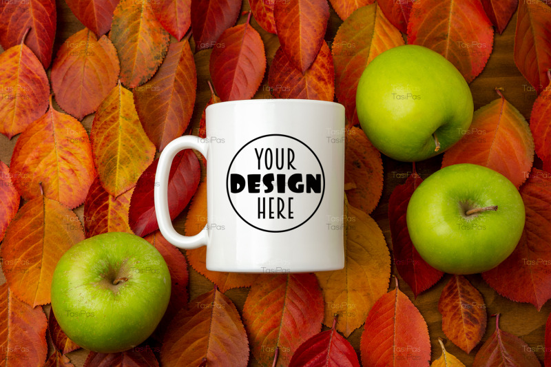 white-coffee-mug-mockup-with-red-fall-leaves-and-green-apples