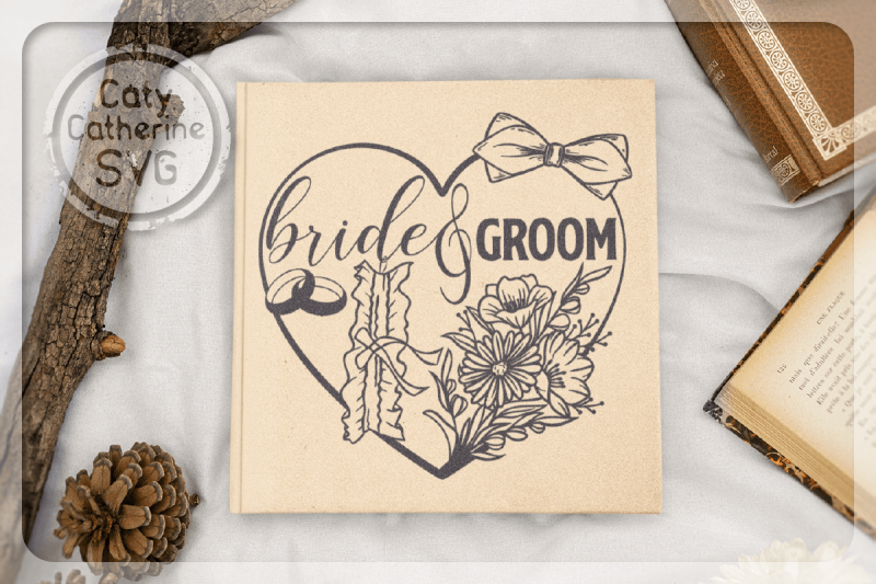 bride-amp-groom-love-heart-with-bow-tie-and-garter-svg-cut-file