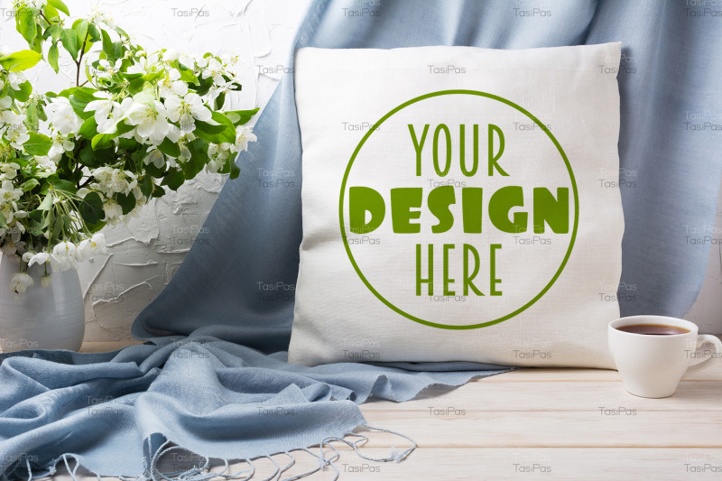 pillow-mockup-with-apple-blossom-branches-and-blue-scarf