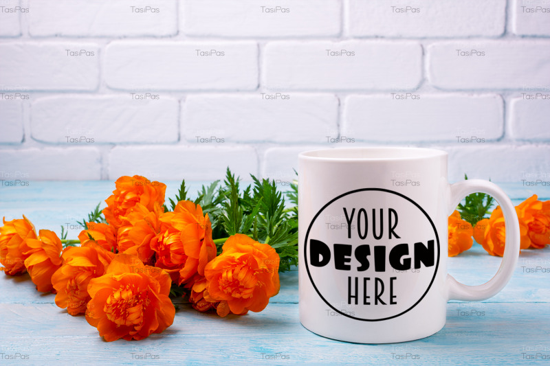 white-coffee-mug-mockup-with-orange-globeflowers