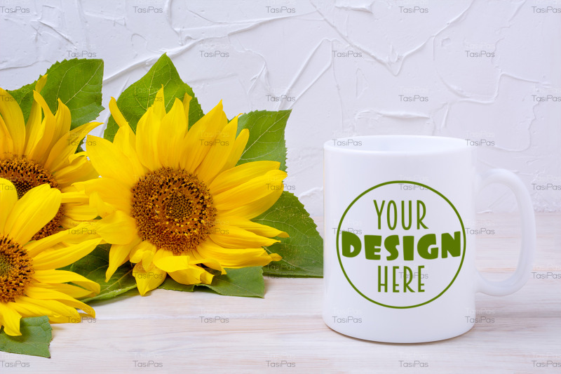 white-coffee-mug-mockup-with-sunflowers-bouquet