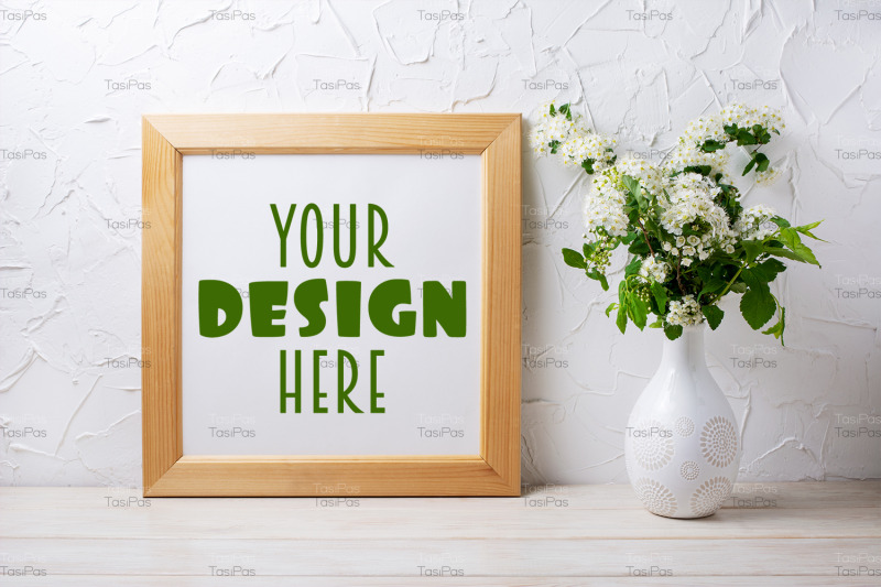 square-wooden-picture-frame-mockup-with-viburnum-in-the-vase