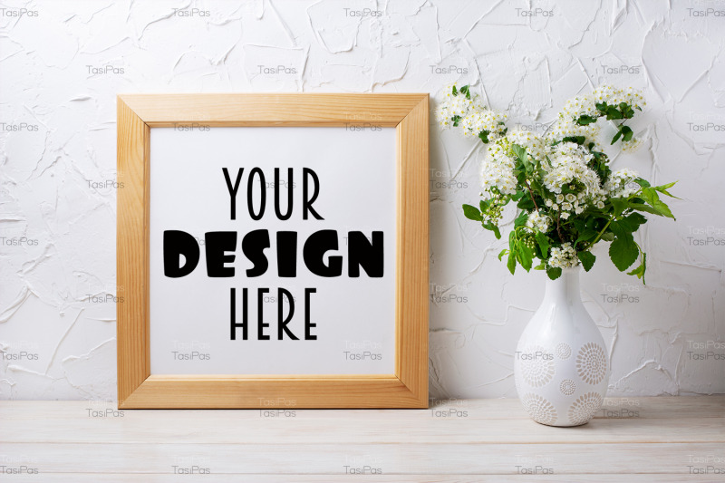 square-wooden-picture-frame-mockup-with-viburnum-in-the-vase