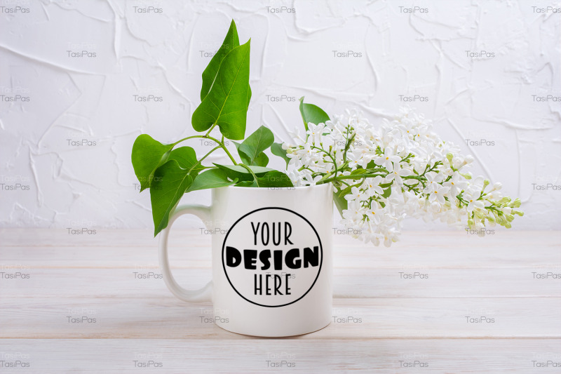white-coffee-mug-mockup-with-tender-white-lilac-branch